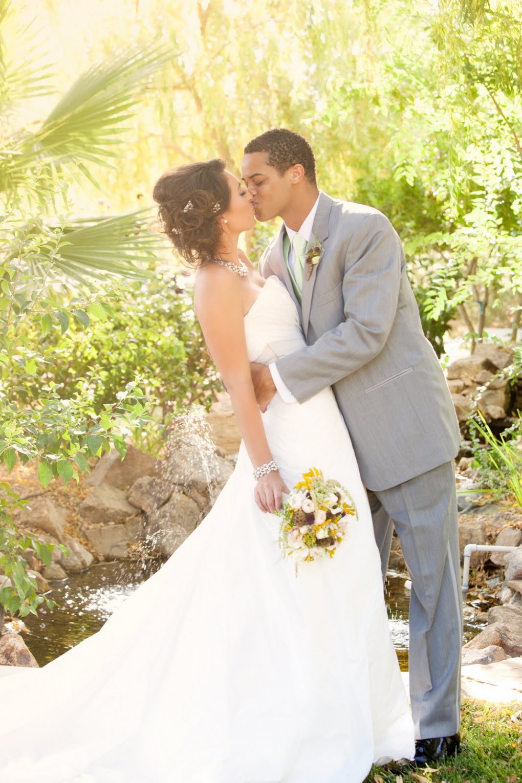 bride and groom kiss