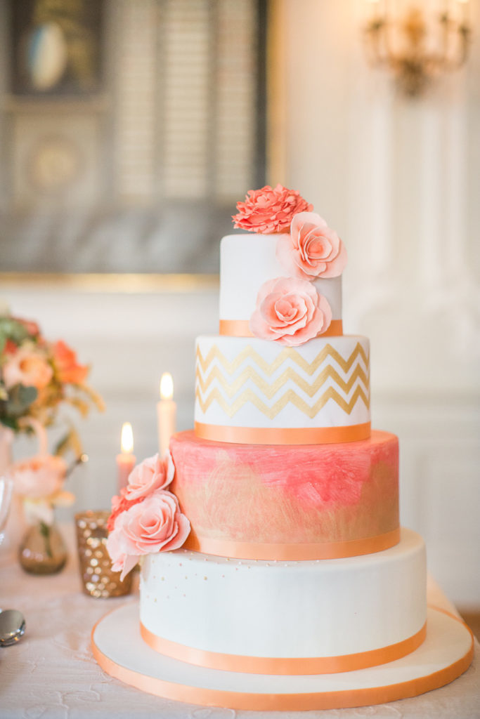 4 tier coral and white wedding cake