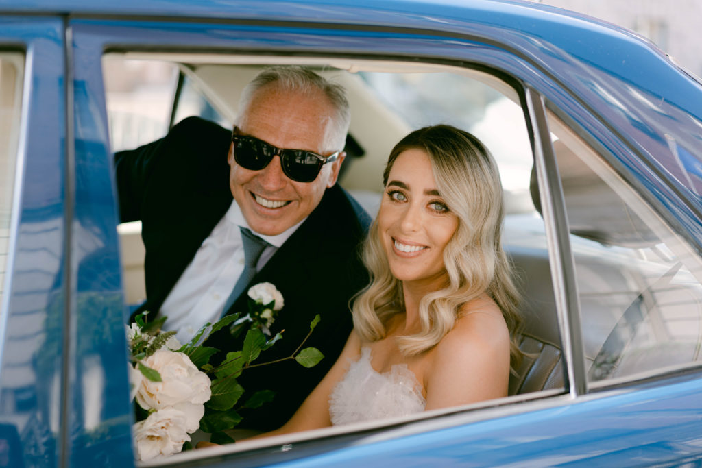 Irish bride and father of the bride in wedding car