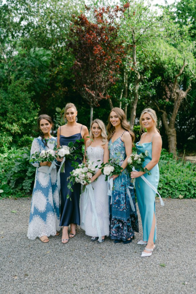 Irish bride and her bridesmaids standing in the grounds of Number 25 Fitzwilliam in Dublin