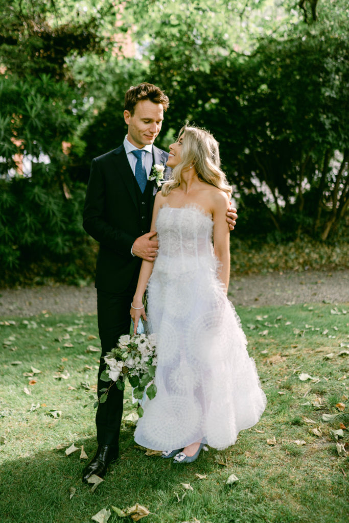 Irish bride and groom on the ground of Number 25 Fitzwilliam in Dublin, looking into each-others eyes